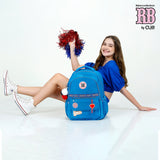 Mochila escolar Rebecca Bonbon con pompones y parches