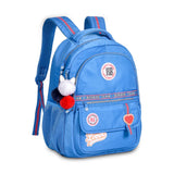 Mochila escolar Rebecca Bonbon con pompones y parches